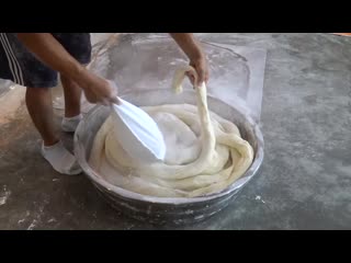 long noodles gaocheng, or dragon whiskers. handicraft production process.