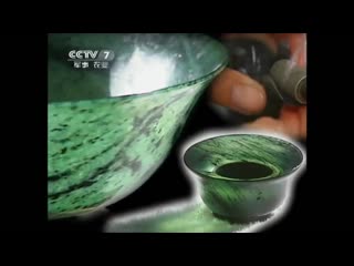 a luminous jade cup, a goblet made of white jade ye'guangbei, or mu wang, which means `moonwalker`.