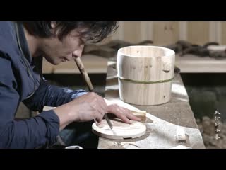 chinese traditional crafts. manufacturing technology of a wooden barrel mutun.