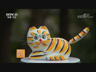 two-faced and two-sided clay cat shuangmian ni mao, the mascot of banshan city, zhejiang province, in the yangtze river valley. dan