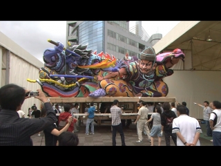 japanese crafts... giant nebuta paper lanterns (luminous sculptures made of rice paper and wood) at a japanese festival