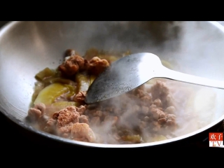 men in the kitchen. collection of pomelo fruits. meat in thai style with peel and zest pomelo.